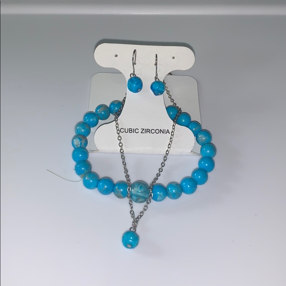 earring, necklace, and bracelet set